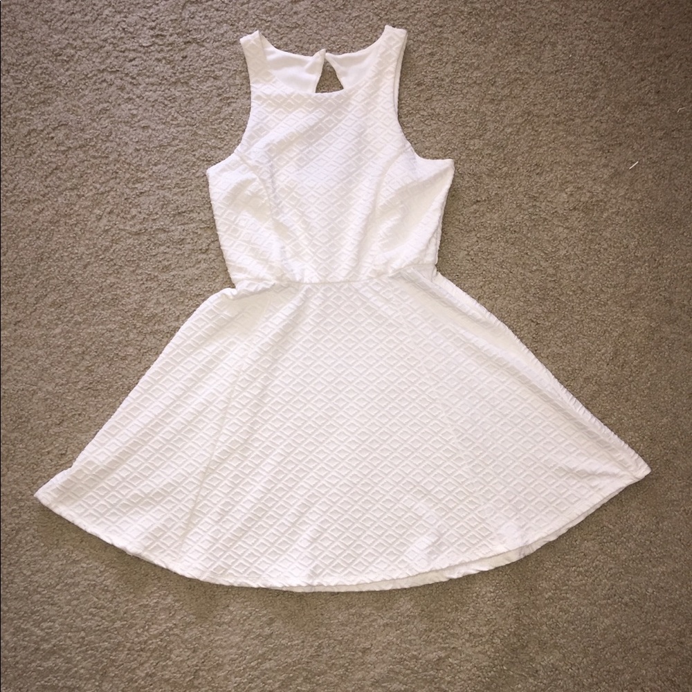 White fit n flair dress with cut out back
